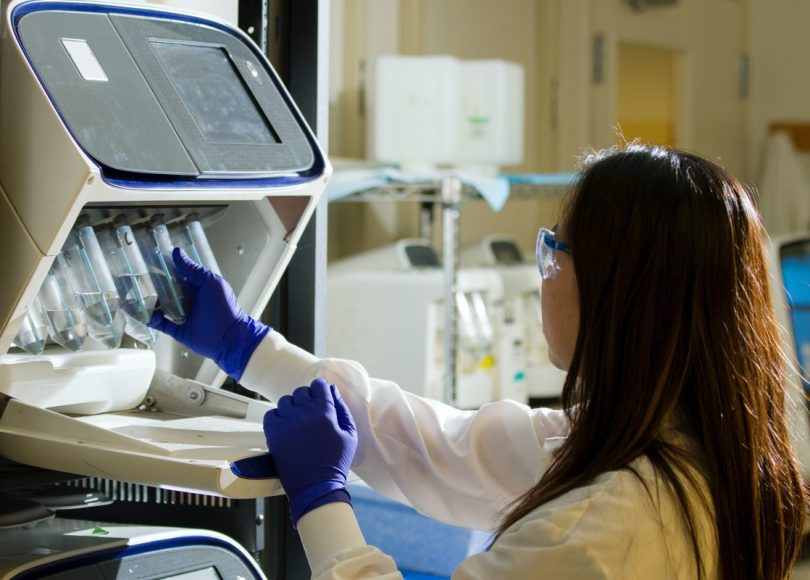 Scientist in laboratory working on a new treatment for triple negative breast cancer.